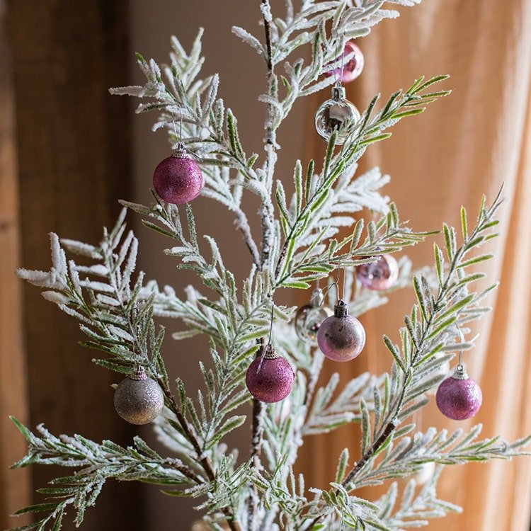 Cedar Fir Tree Snow Flocked Christmas Tree in Paper Wrapped Base, holiday tree for festive indoor Christmas decorating
