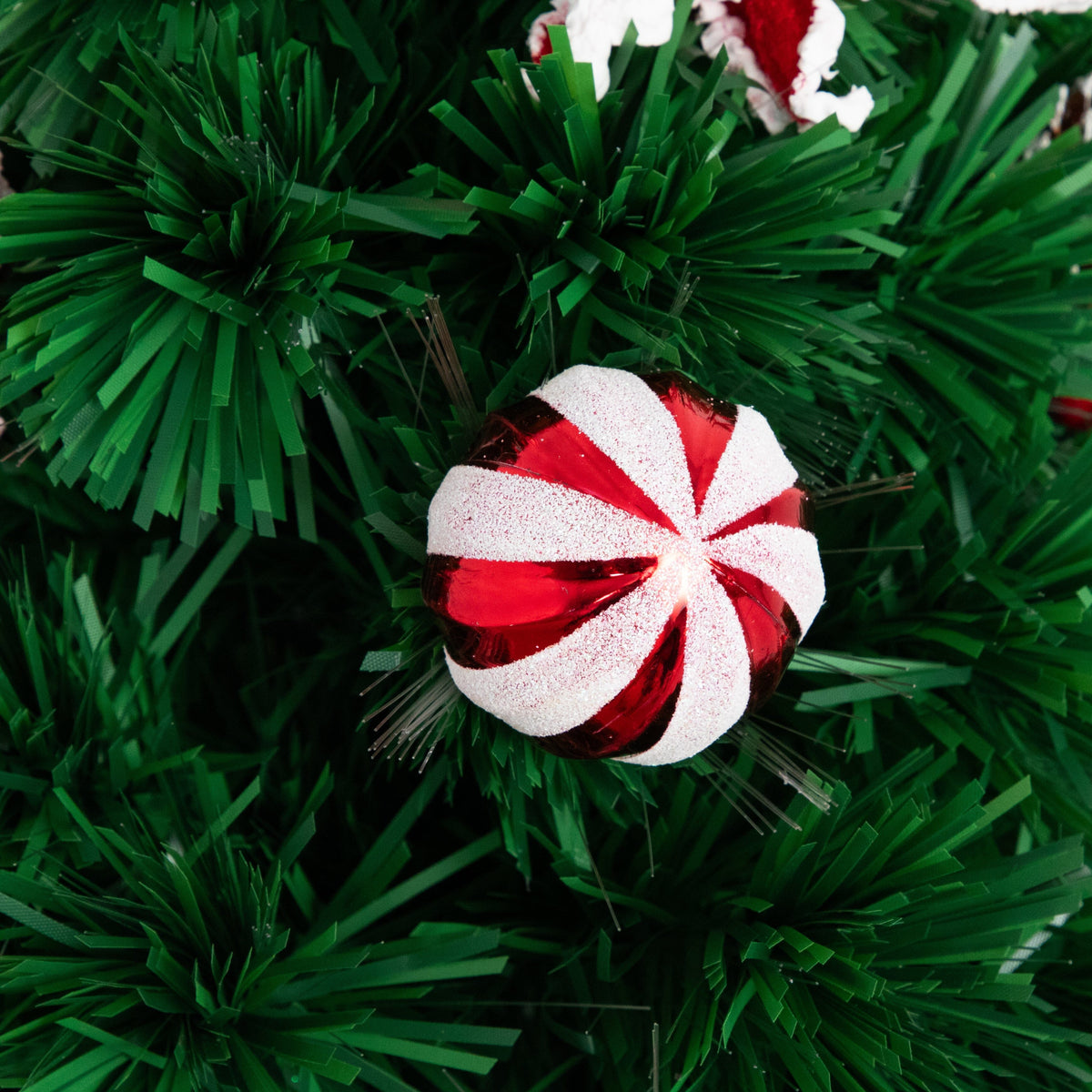 24" Pre-Lit Fiber Optic Artificial Christmas Tree with Ornaments, Poinsettia and Star Topper, Christmas ornament for festive holiday tree decor from Cedar &...