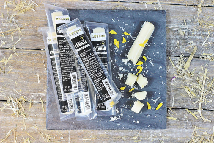 8-Year Aged Cheddar Snack Sticks (30-Pack), savory cheese selection for gift baskets, gatherings and special occasions