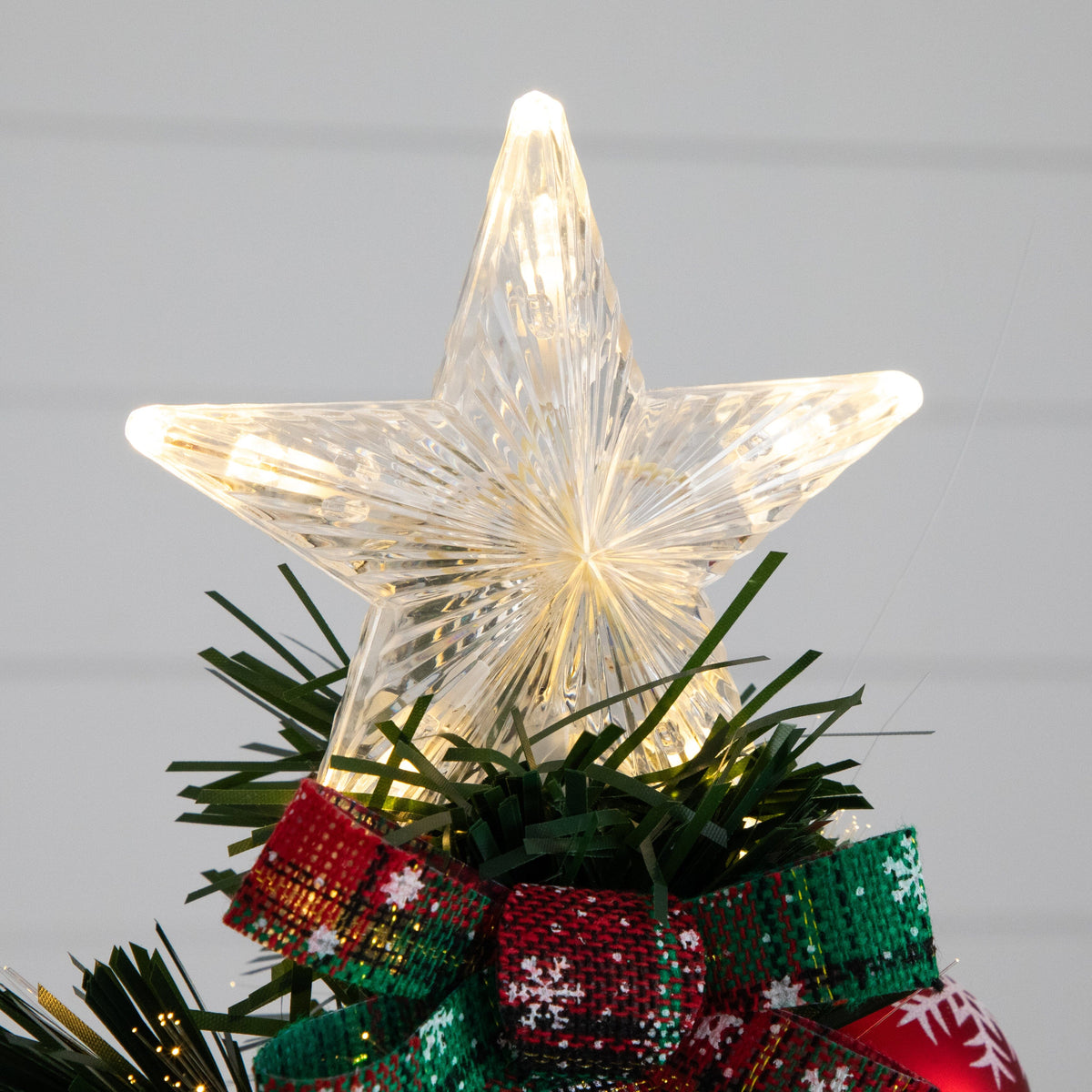 24in. Pre-Lit Fiber Optic Cosmopolitan Star Topped Artificial Christmas Tree with Decorative Planter, holiday tree for festive indoor Christmas decorating