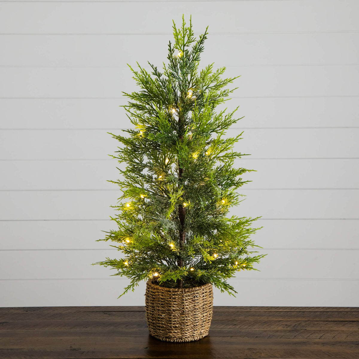 32" Pre-Lit Artificial Lightly Snowed Cypress Christmas Tree with 30 Warm White LED Lights in Decorative Weaved Basket, holiday tree for festive indoor Chris...
