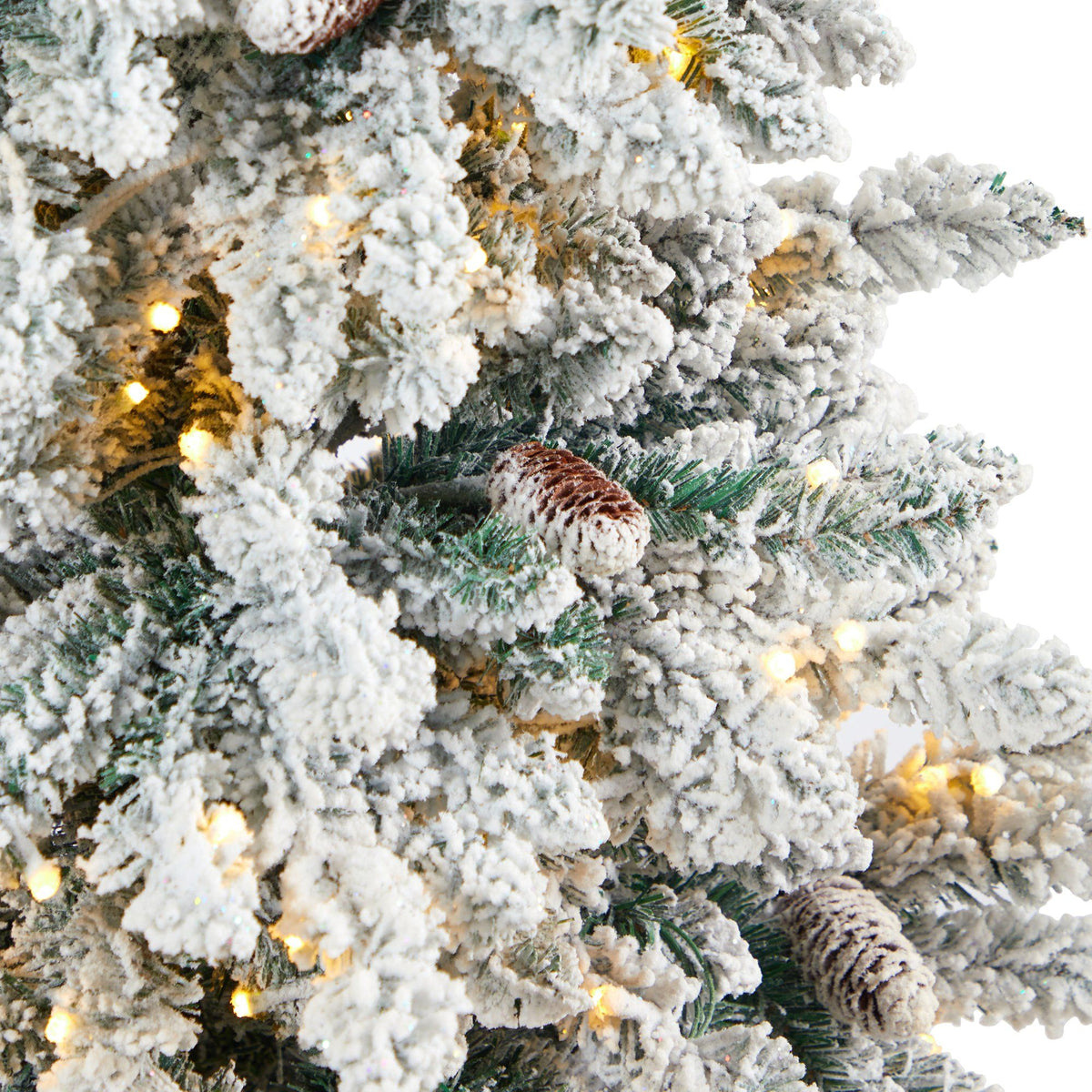 4.5’ Flocked Livingston Fir Artificial Christmas Tree with Pine Cones and 150 Clear Warm LED Lights in Tall White Planter