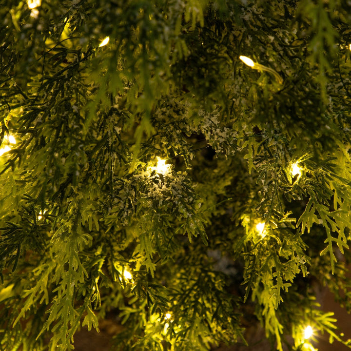 5’ Pre-Lit Artificial Snowed Cypress Christmas Tree with 140 LED Lights in Hyacinth Basket