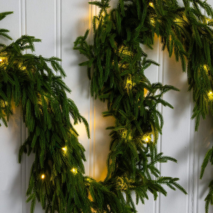 9' Pre-Lit Artificial Real Touch Norfolk Island Pine Garland with 50 Warm White LED Lights and Natural Look, evergreen home accent for fireplace, railing or...