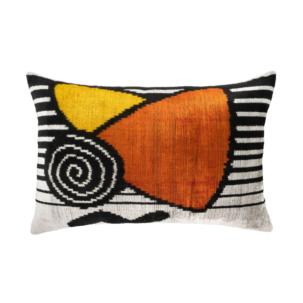 Decorative velvet Ikat throw pillow with geometric pattern on a white background